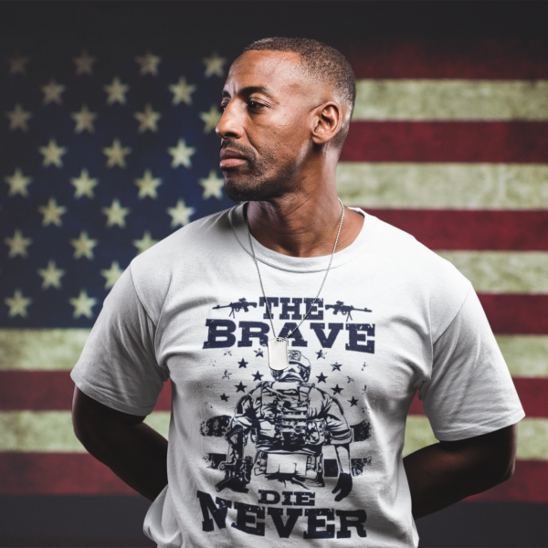 The brave never dies - man-wearing-a-tshirt-mockup-standing-against-an-american-flag-a20924